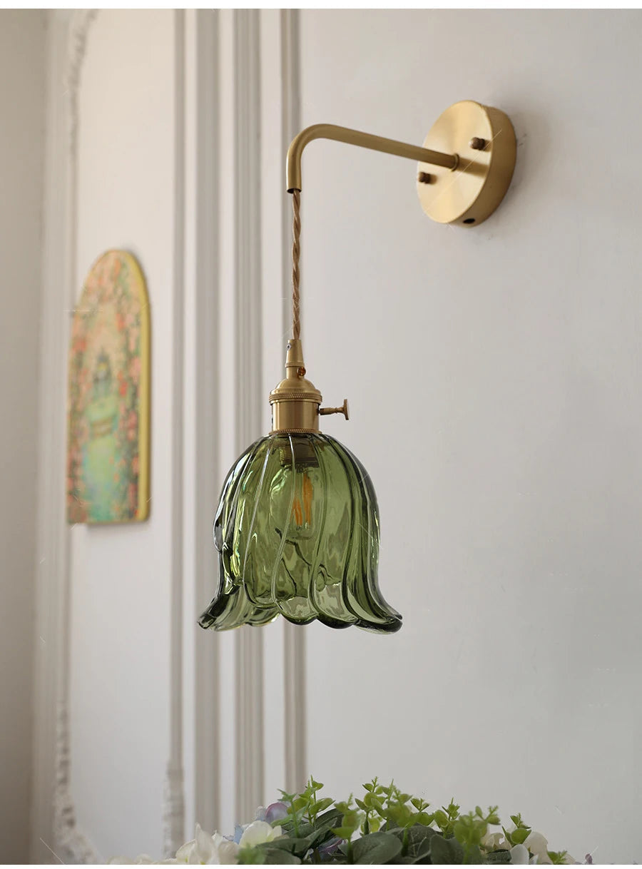 Modern wall sconce in glass and vintage brass adjustable