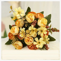 Wedding decoration artificial flowers in silk and green plants