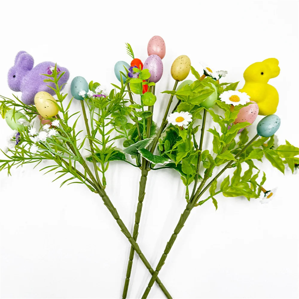 Artificial floral decoration of Easter with rabbits and eggs