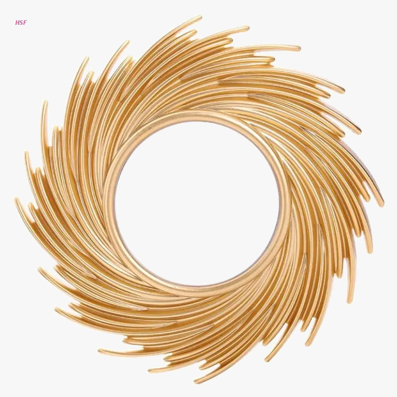 Decorative mirror in rotin in the shape of a sun modern and elegant design