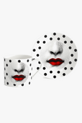 Porcelain cup artistic face pattern with saucer