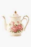 Teapot with elegant refined ceramic bordered saucer
